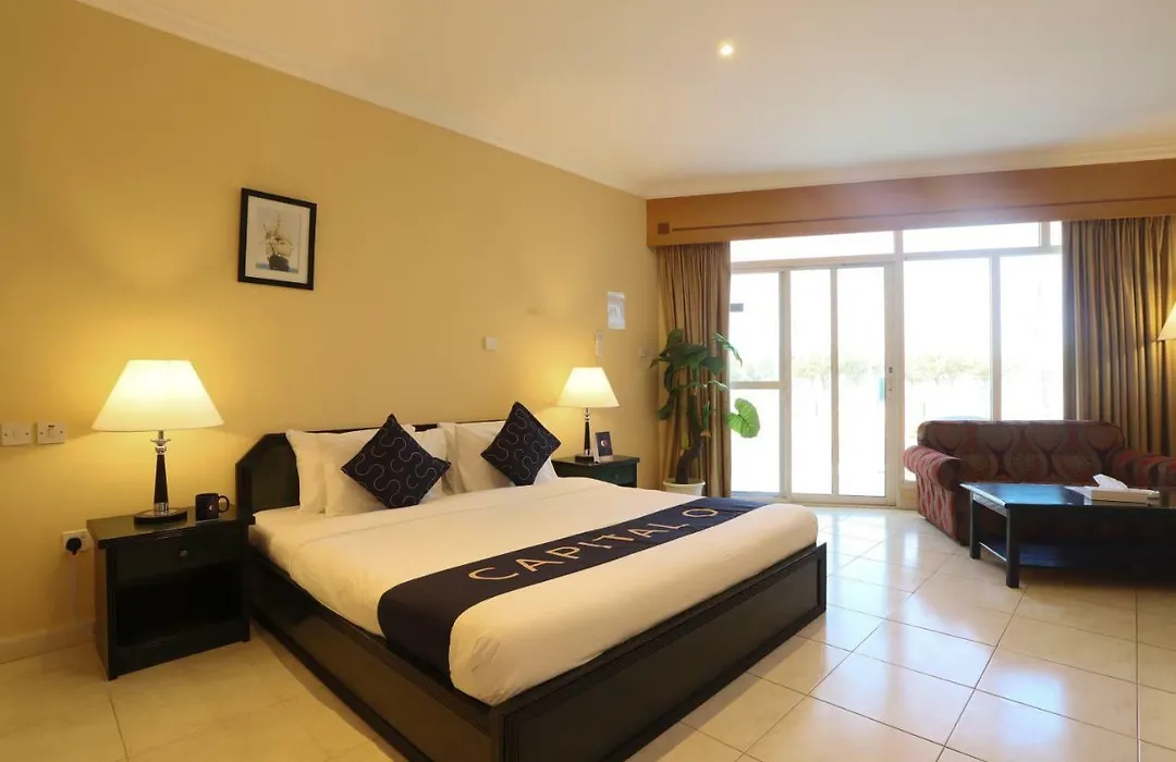 Capital O 224 Holiday Beach Resort-1